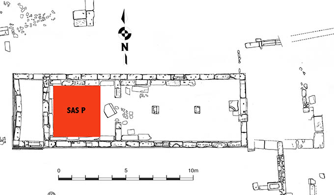 Plan of archaeological site in black and white with red highlighted area.