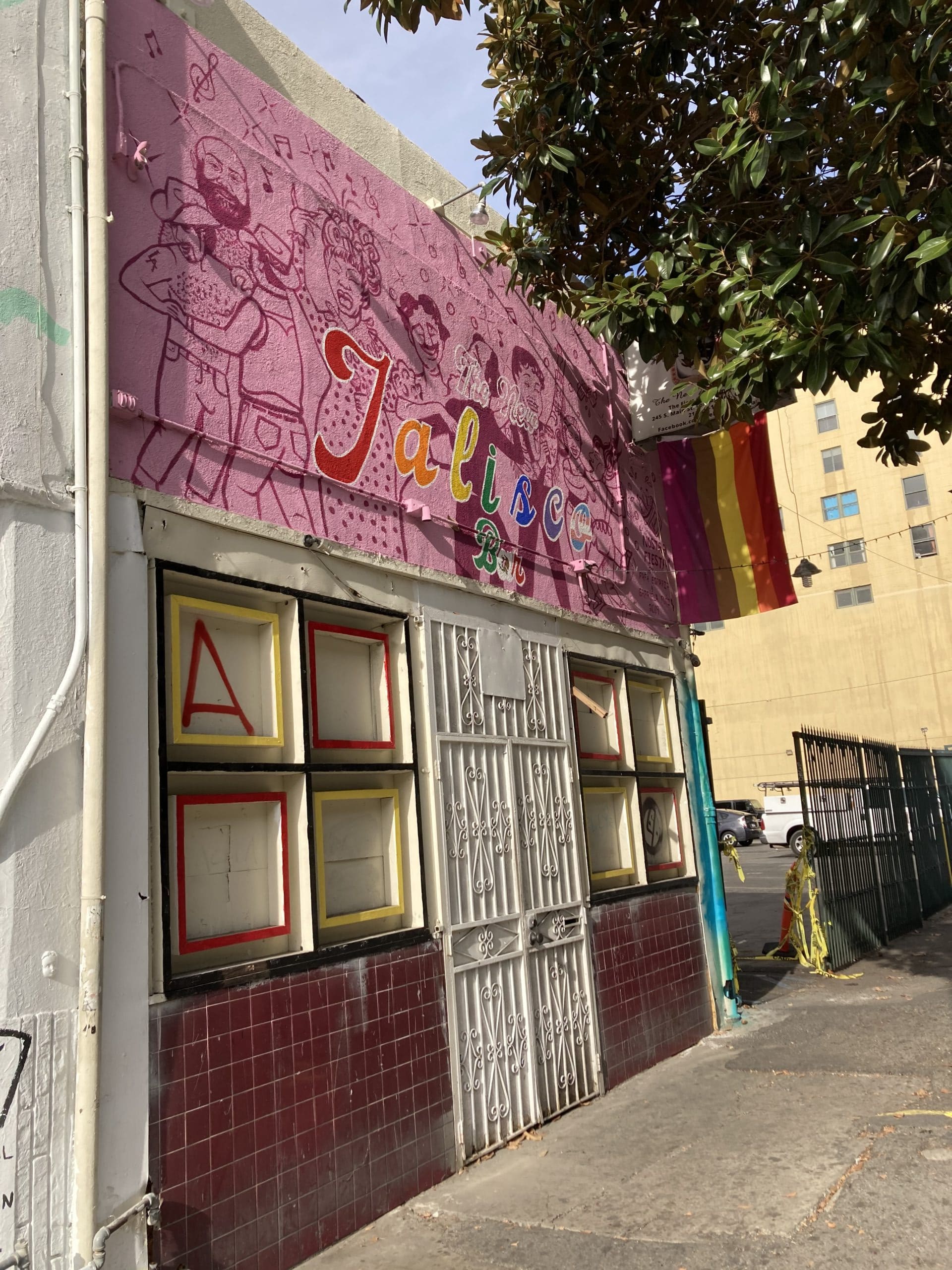 The New Jalisco Bar exterior during the afternoon with a mural by Rafa Esparza and
                            Gabriela Ruiz.