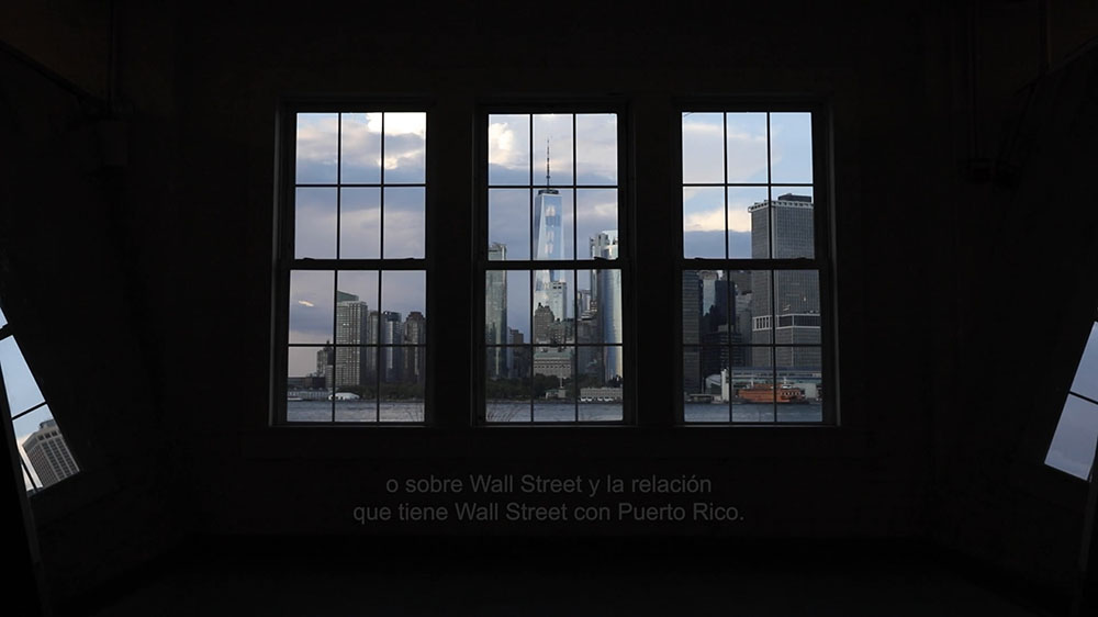 View of Wall Street through windows.