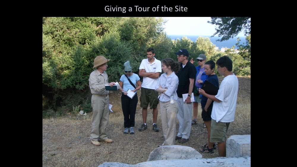 Photo of Jim giving a tour of the archaeological site
